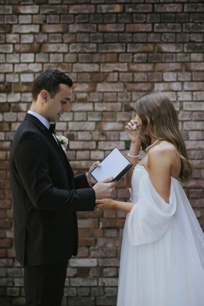 Bride and groom sharing an emotional first look at an elegant Washington estate wedding.
